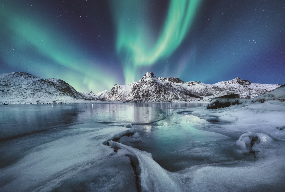 Arctic ocean with aurora borealis