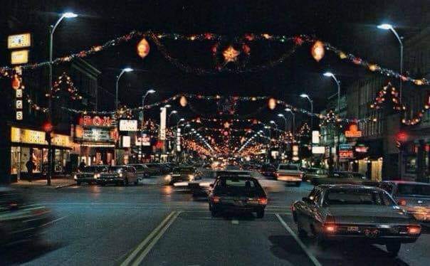 Vintage photo of downtown Pittsburg, Kansas with Christmas lights