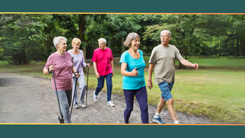 A photo of five senior citizens enjoying a brisk walk outdoors.