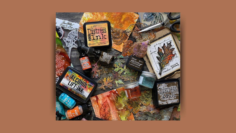 This month, we will have a plethora of fall craft supplies, including die cut leaves, pumpkins, and more. Learn the art of using Ranger Distress Ink pads to add fall color to your designs.